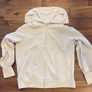 Cream jacket with oversized neck